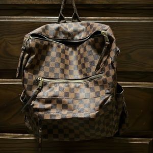 Brown checkered backpack with straps